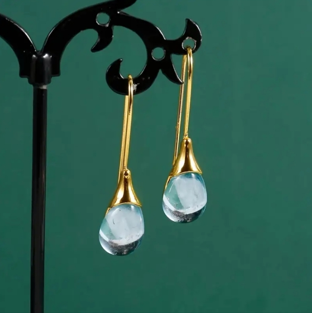 REDUCED!!! Oval cut gemstone hook drop earrings light blue gold plated.